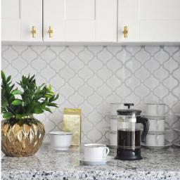 White-kitchen-backsplash-tile-gray-countertop-600x900.jpg