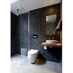03-large-scale-matte-black-hexagon-tiles-with-white-grout-make-the-walls-bold-and-outstanding.jpg